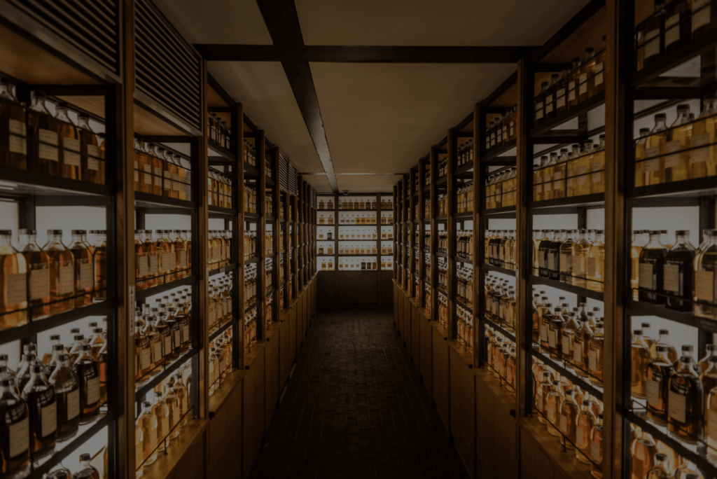 Room full of whiskey cabinets storing different types of coconut whiskey